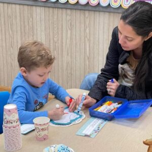 Mom making crafts with her child